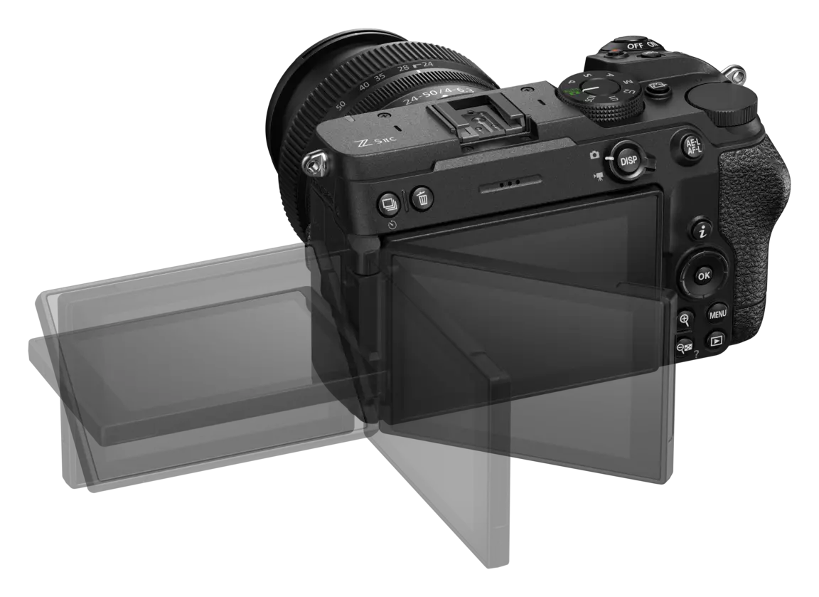 Schwarze Nikon Z Systemkamera mit NIKKOR-Objektiv und seitlich ausgeklapptem, schwenkbarem Display auf schwarzem Hintergrund.