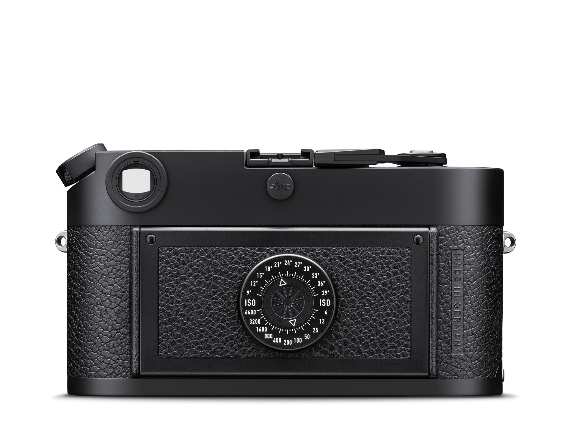 Die Rückansicht der legendären, mattschwarzen Leica M6 Messsucherkamera vor weißem Hintergrund, die sich durch den Verzicht auf ein digitales Display und das markante, kreisrunde ISO-Einstellrad (Filmpatronen-Merkscheibe) auf der strukturierten Rückklappe