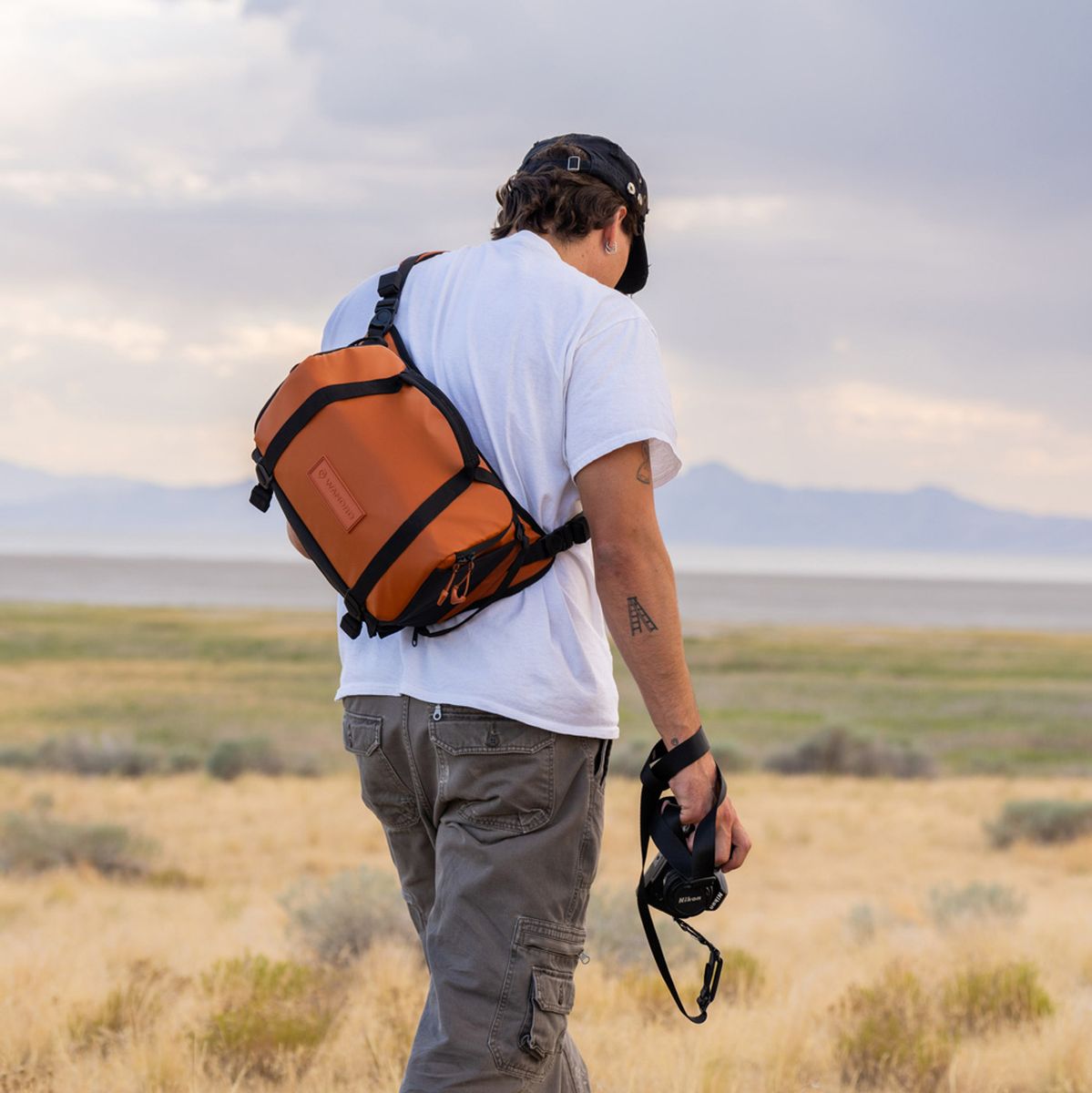 WANDRD Rogue Sling 9l Sedona Orange V2 (+ Gratis WANDRD Socks)